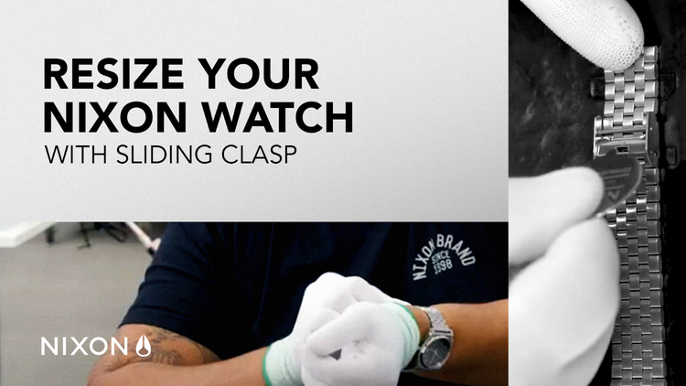 Sliding clasp on a metal watch band